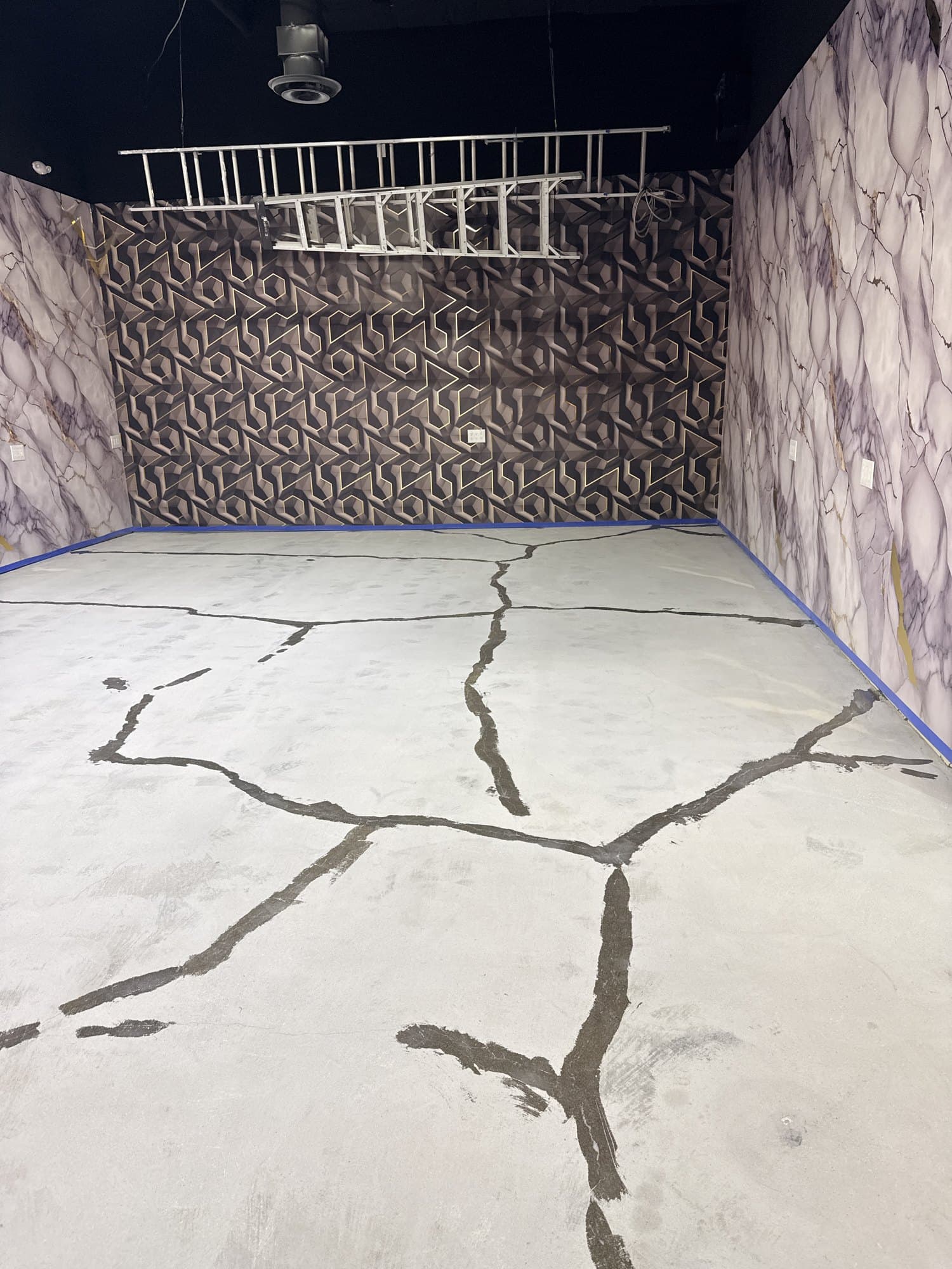 A commercial showroom slab cracked in several places before epoxy installation