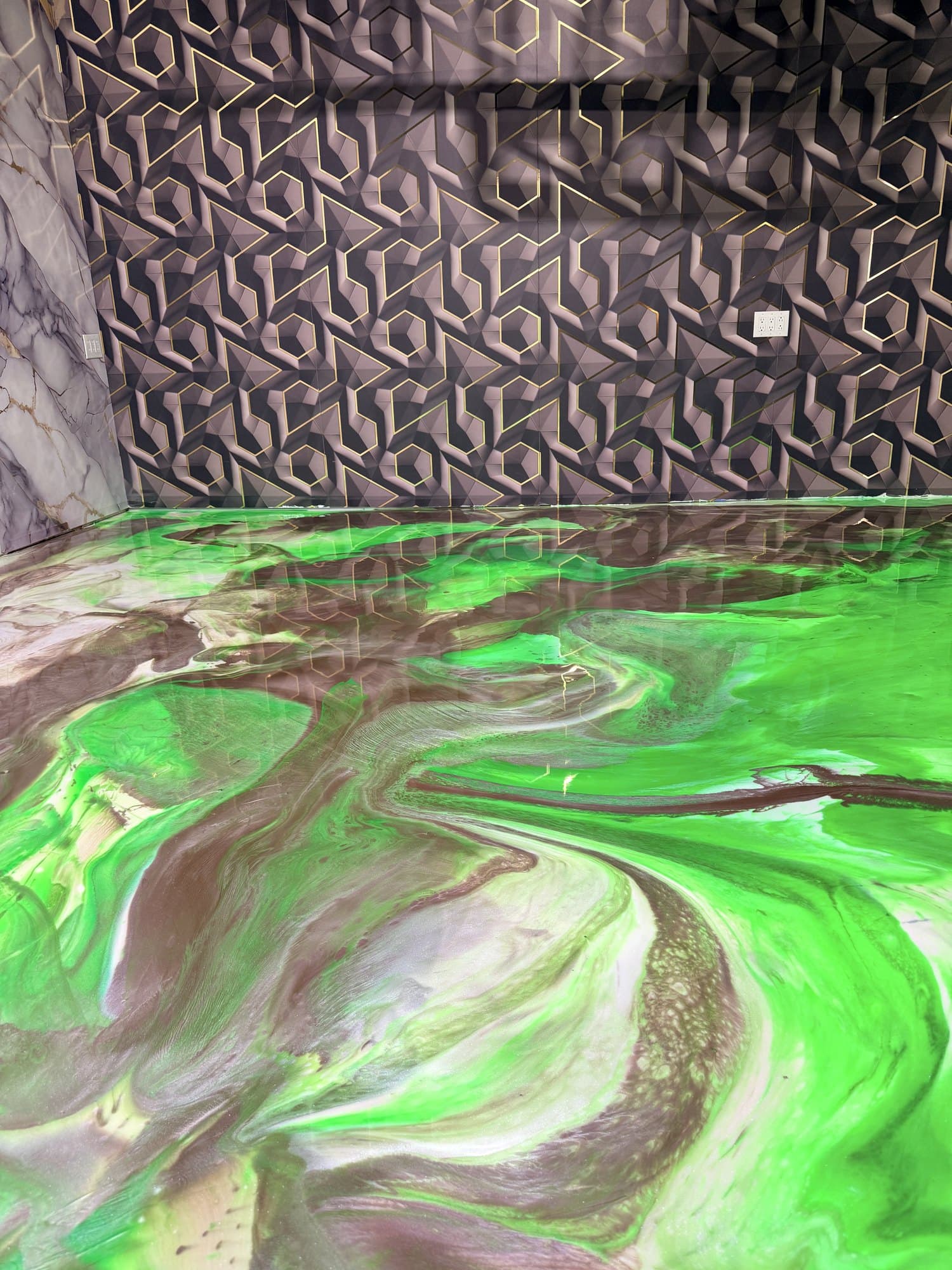 Detail of the cured green metallic surface showing depth and reflection